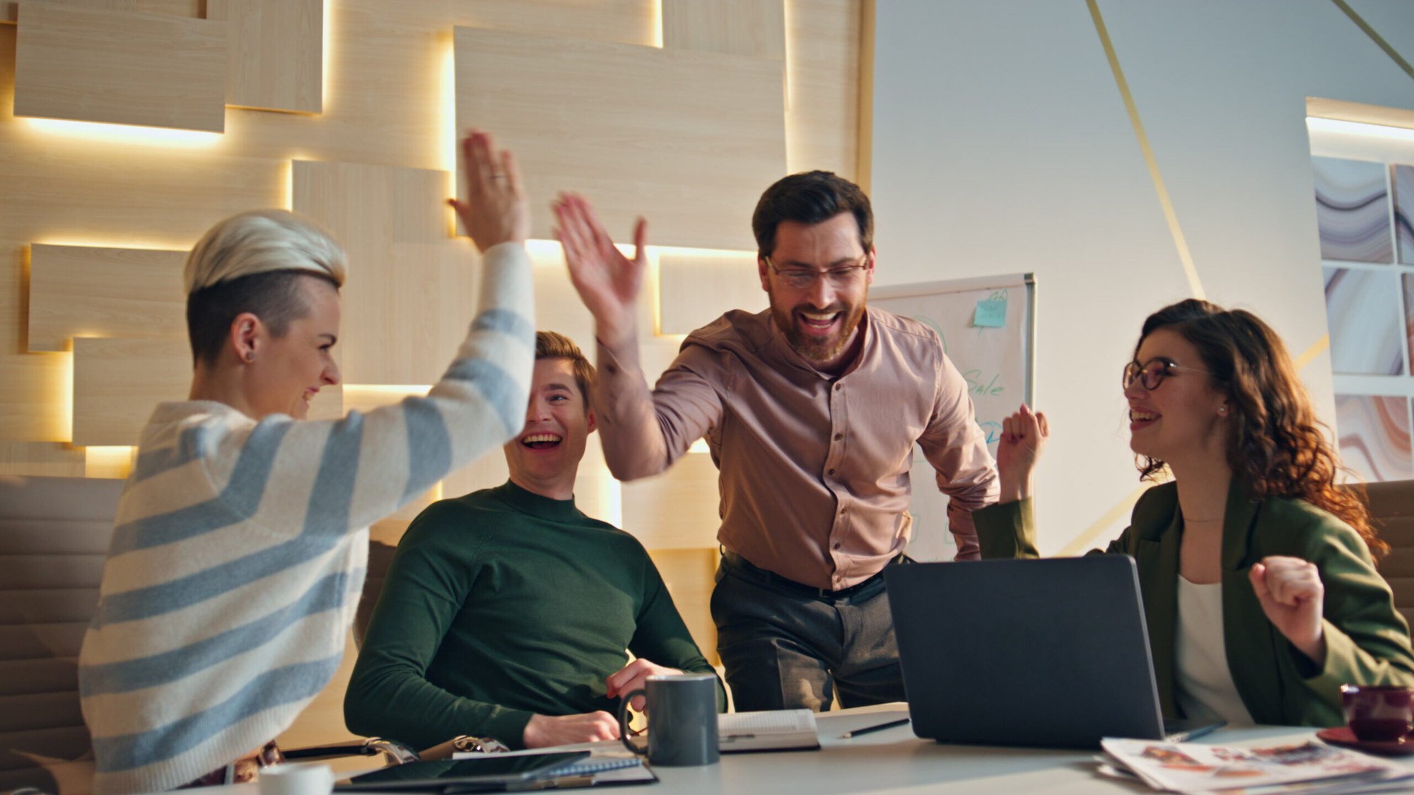 photodune-CecsEbBi-successful-team-giving-five-rejoicing-business-achievement-in-conference-room-l-scaled photodune-CecsEbBi-successful-team-giving-five-rejoicing-business-achievement-in-conference-room-l-scaled